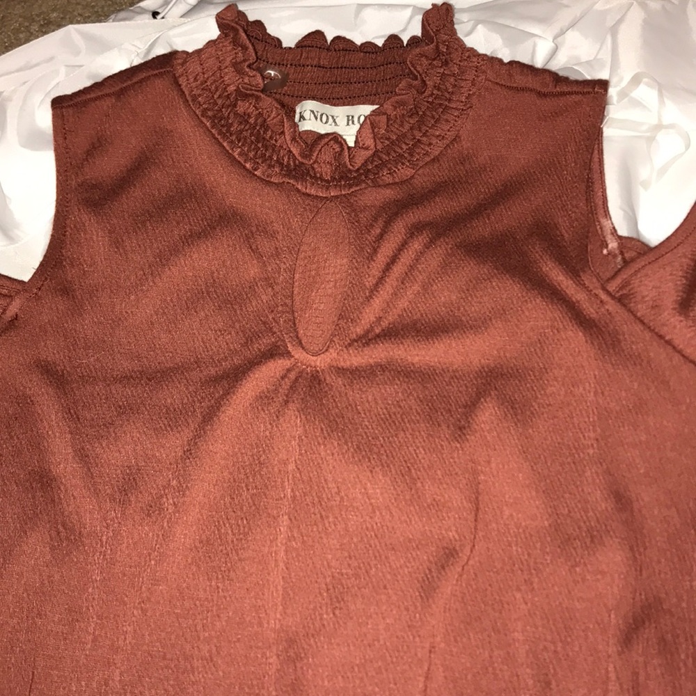 rust orange/brown shirt